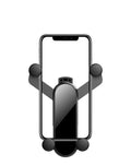 Italian Gravity Car Phone Holder in black, showcasing its stable and non-slip design for all smartphones. Black Italian Gravity Car Phone Holder installed on a car air vent, providing easy access to your device.