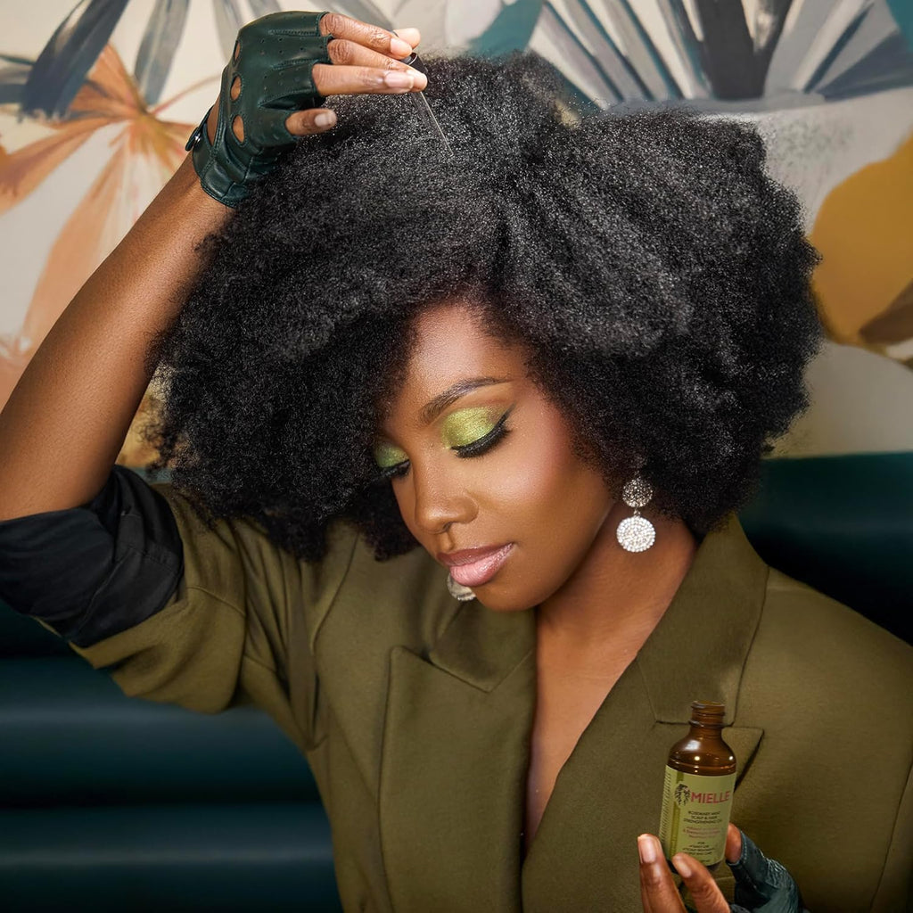 Mielle Rosemary Mint Hair Oil – Biotin-infused treatment for hair growth and scalp nourishment in a 2 fl oz (59ml) bottle.